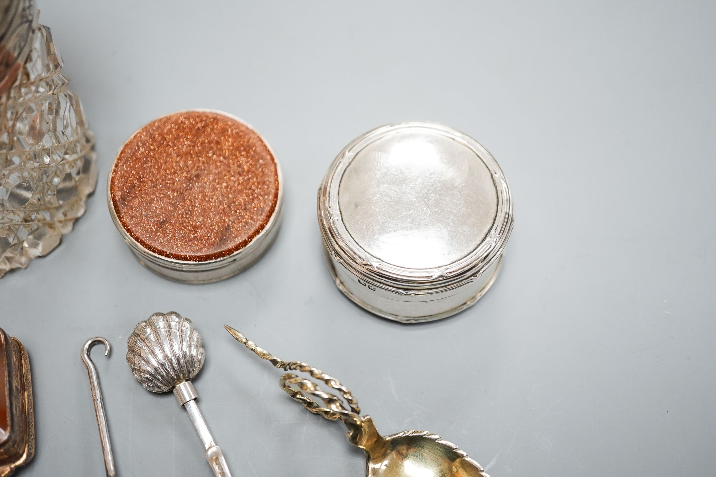 A mid 18th century counter box (adapted?), 4cm, a George V silver pill box, a banded agate set copper snuff box, two small gilt white metal spoons stamped '131/2', a George V silver button hook with thistle terminal and